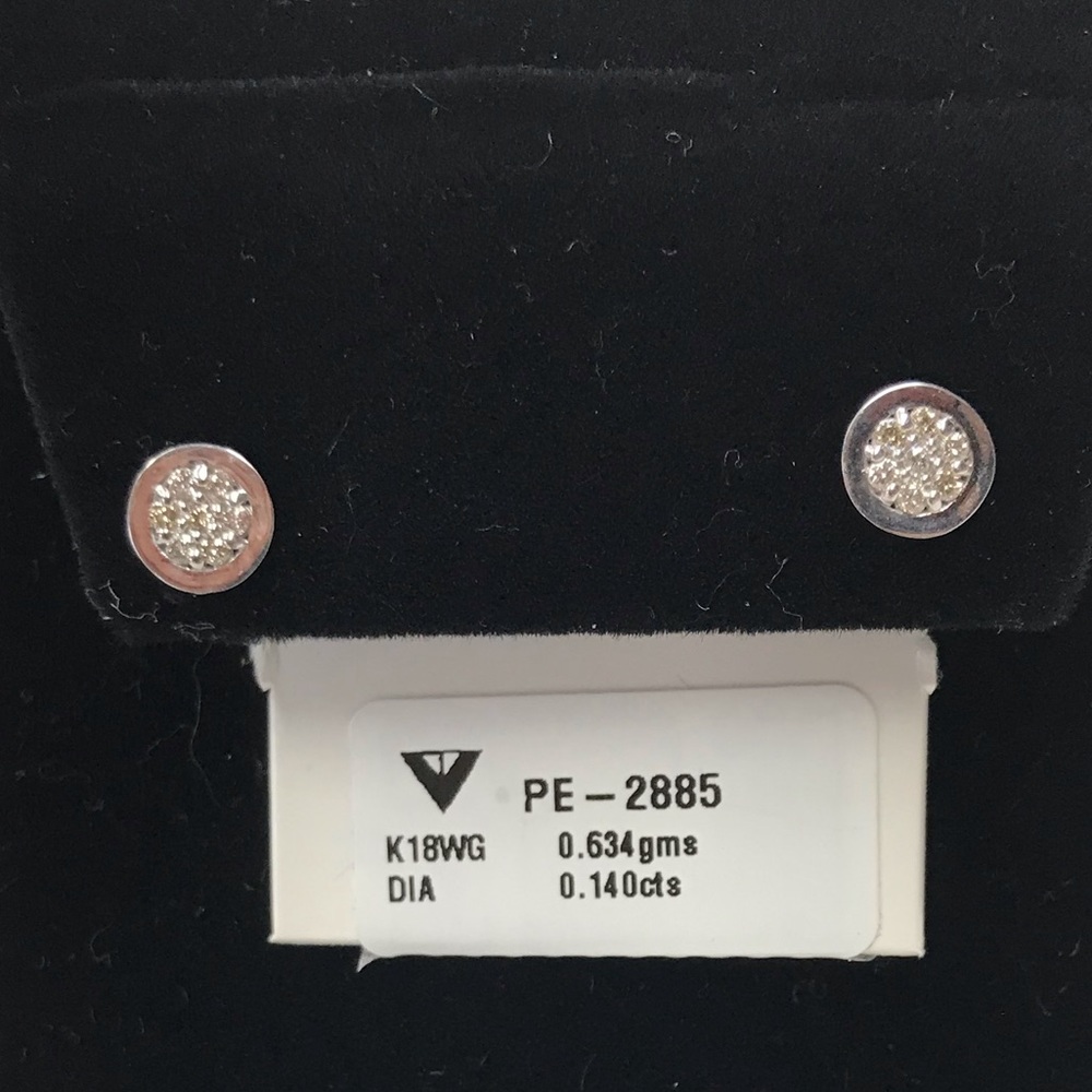 18KT WHITE GOLD WITH .14CT NATURAL DIAMONDS NEW